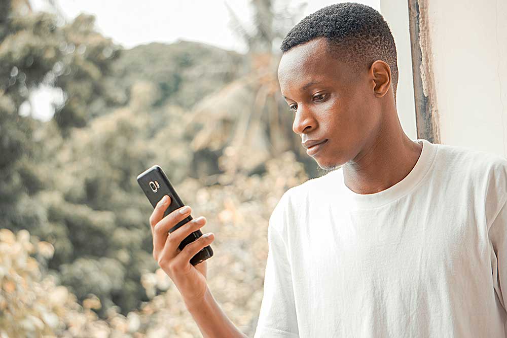 teen looking at phone